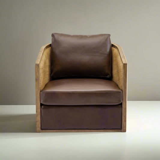Brown armchair with wicker frame on a gray background
