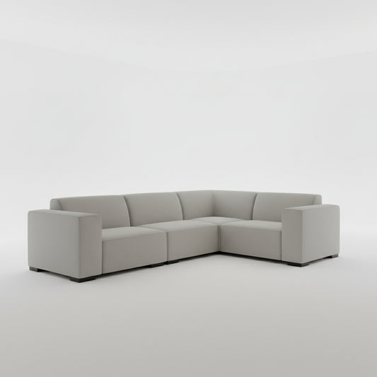 Gray sectional sofa on a plain background