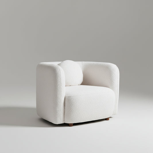 White armchair in a living room with wooden cabinet and window