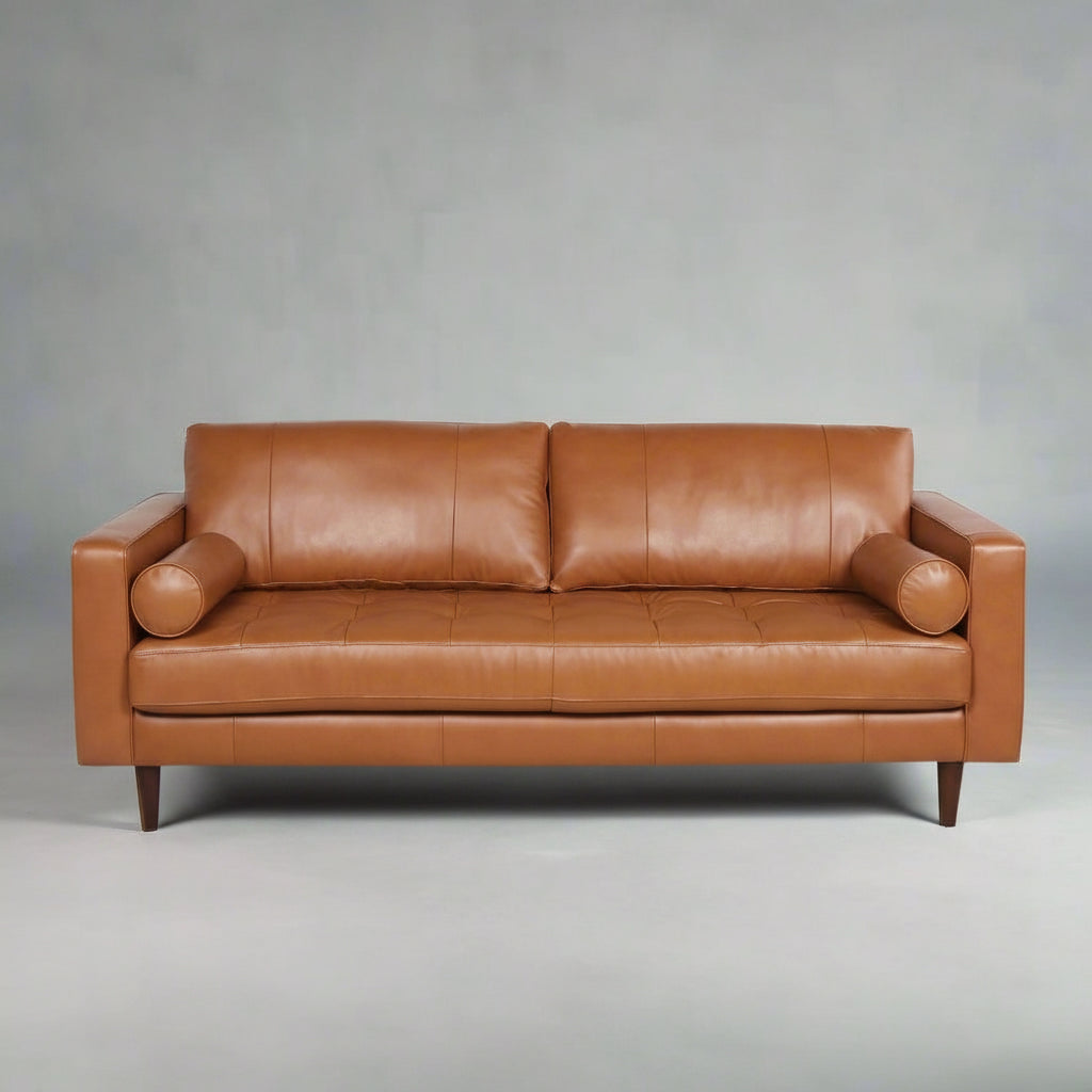 Brown leather sofa on a white background