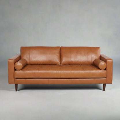 Brown leather sofa on a white background