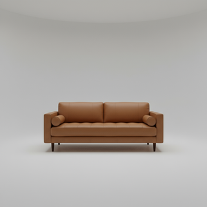 Brown sofa in a modern living room with large windows and cityscape view.