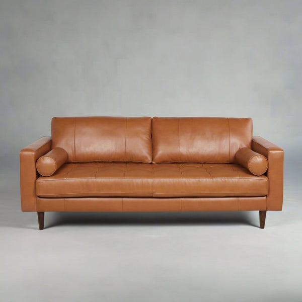 Brown leather sofa on a white background