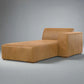 Brown leather chaise lounge on a white background
