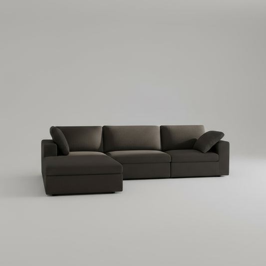 Dark gray sectional sofa on a white background