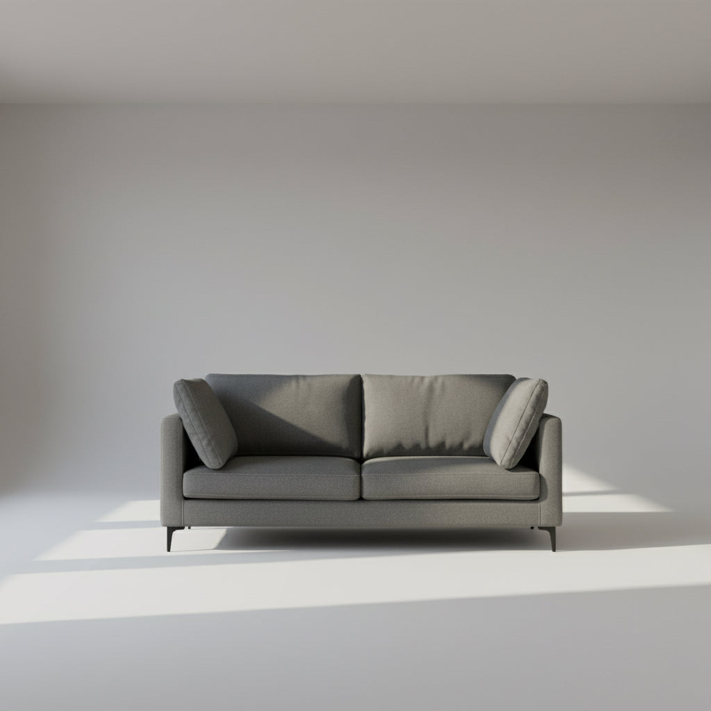 Gray sofa with cushions on a white background