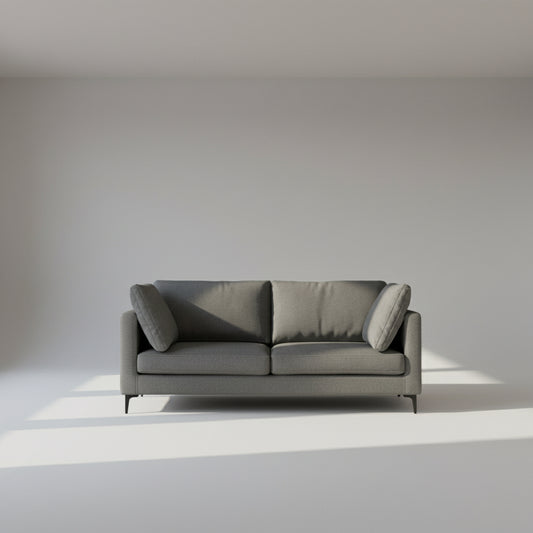 Gray sofa with cushions on a white background