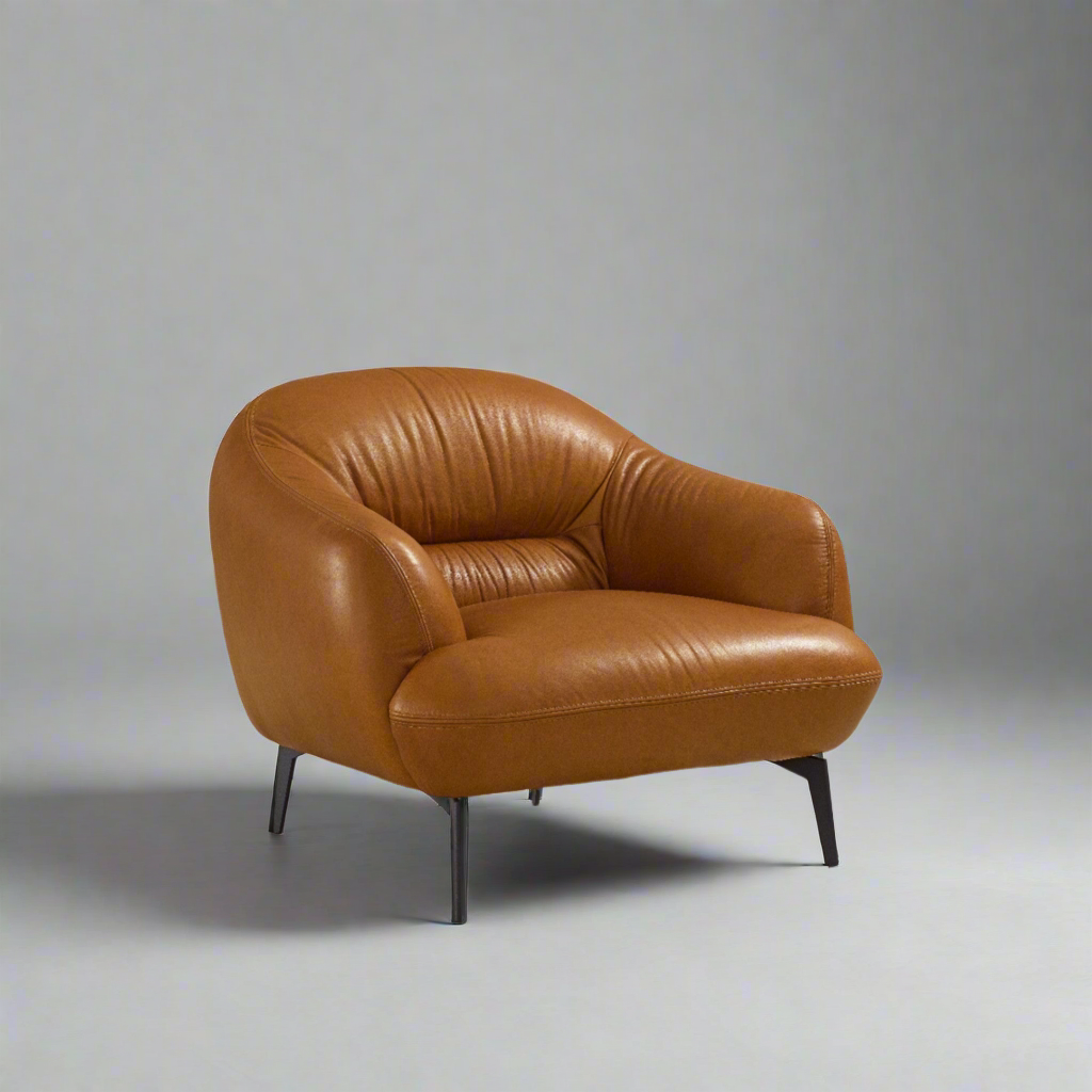 Brown leather armchair on a gray background