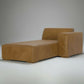 Brown leather sectional sofa on a white background