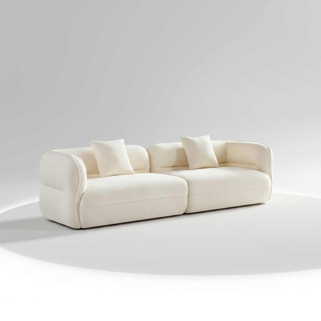 White sofa with two cushions on a white background