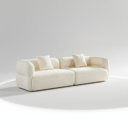 White sofa with two cushions on a white background