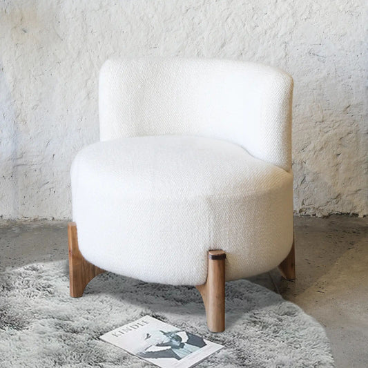 THE LUMA TUFTED ARMLESS LOUNGE CHAIR