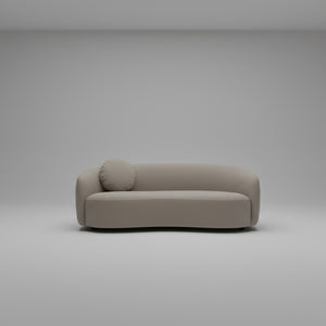 Beige sofa with a round cushion on a light gray background