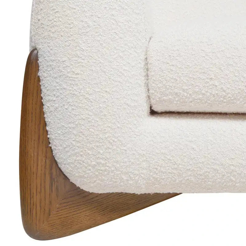 Close-up of a textured white cushion on a wooden chair