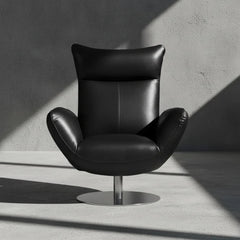 Black leather armchair on a white background