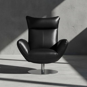 Black leather armchair on a white background