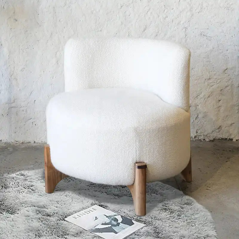 THE LUMA TUFTED ARMLESS LOUNGE CHAIR