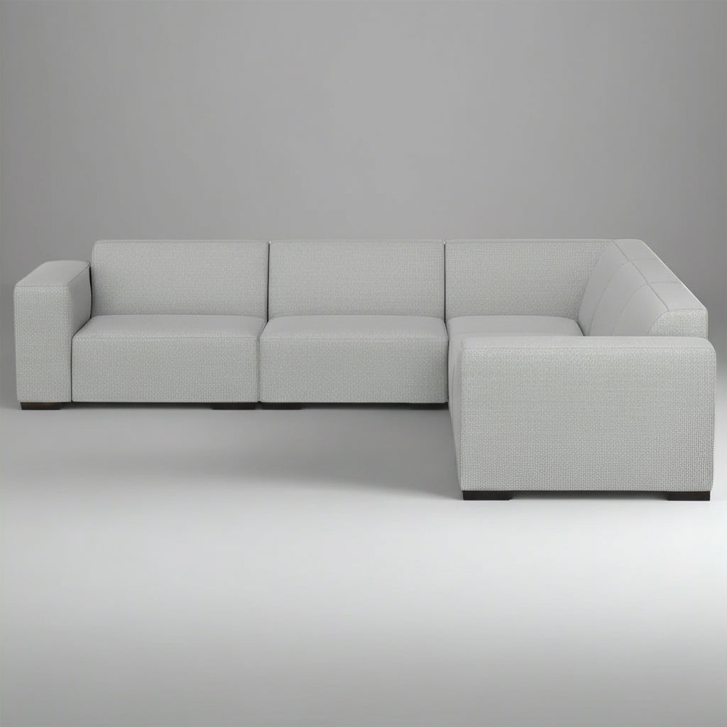 Gray sectional sofa on a plain background