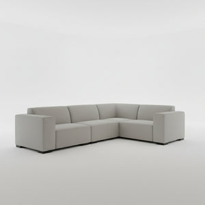 Gray sectional sofa on a plain background