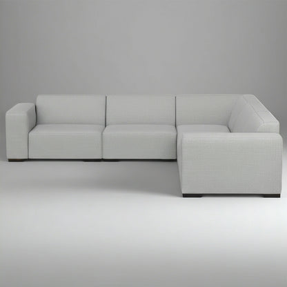 Gray sectional sofa on a plain background