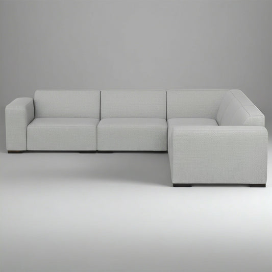 Gray sectional sofa on a plain background