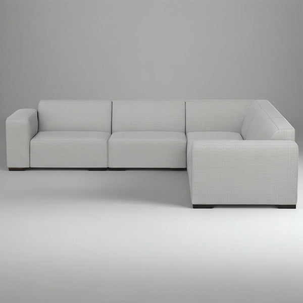 Gray sectional sofa on a plain background