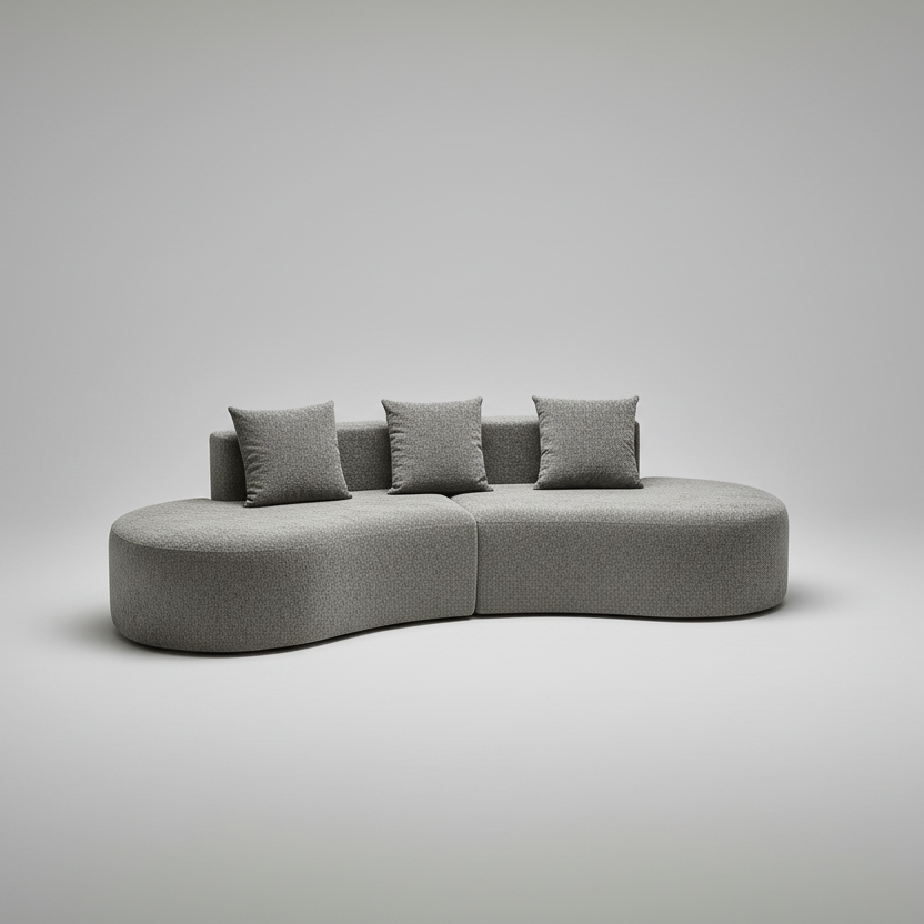 Modern living room with a gray sectional sofa, rug, and window view.