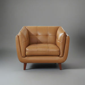 Brown leather armchair on a gray background
