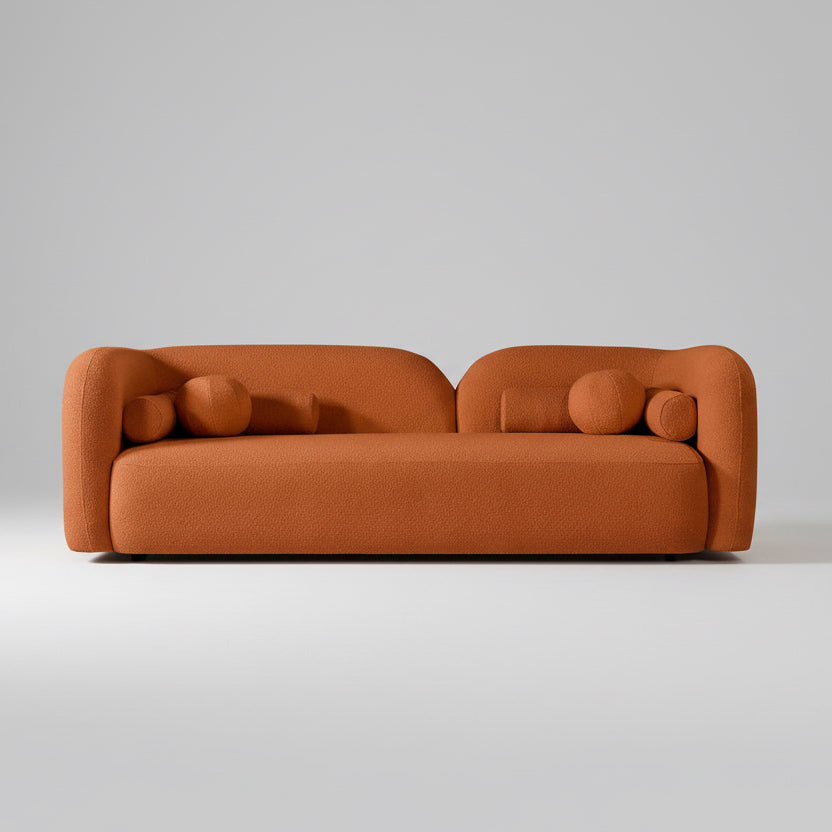 Brown sofa with rounded design on a white background