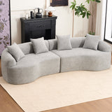 Large Stone Grey curved modular sofa with plush chenille upholstery and flared arms, styled in a modern minimalist living room.